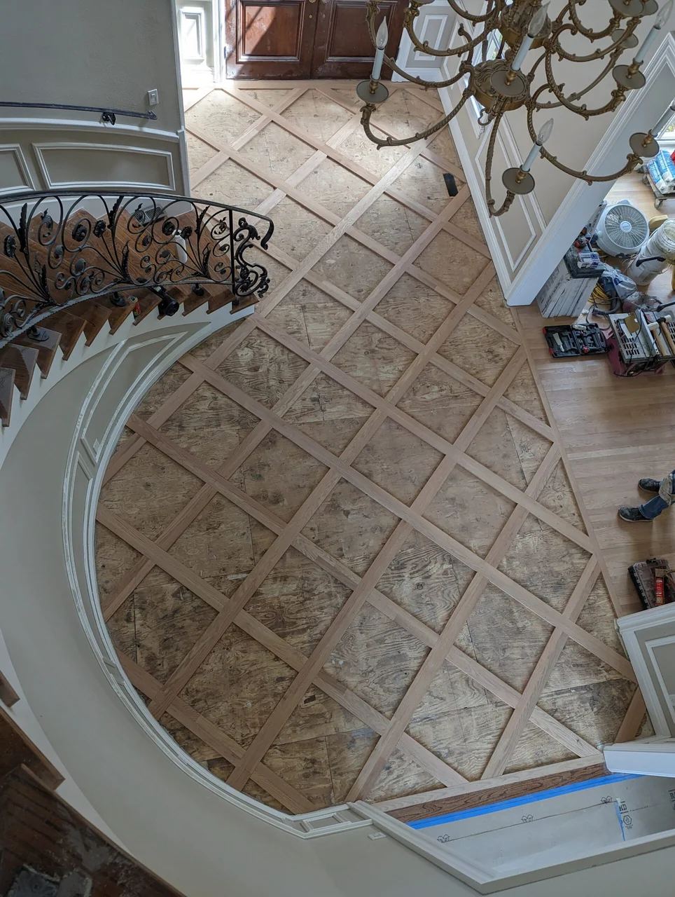 Overhead view of a decorative patterned foyer floor