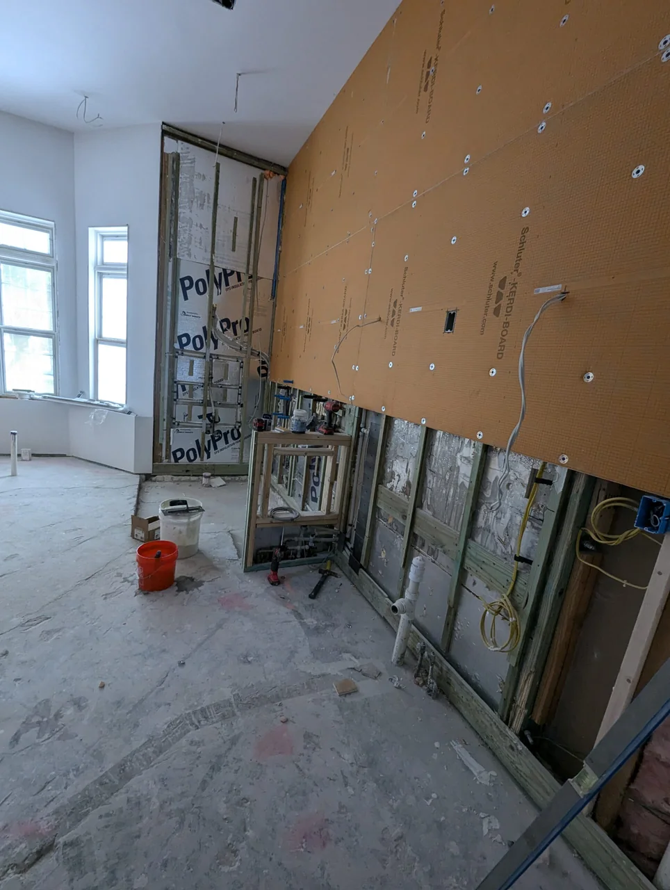 Bathroom walls and floor before tile installation