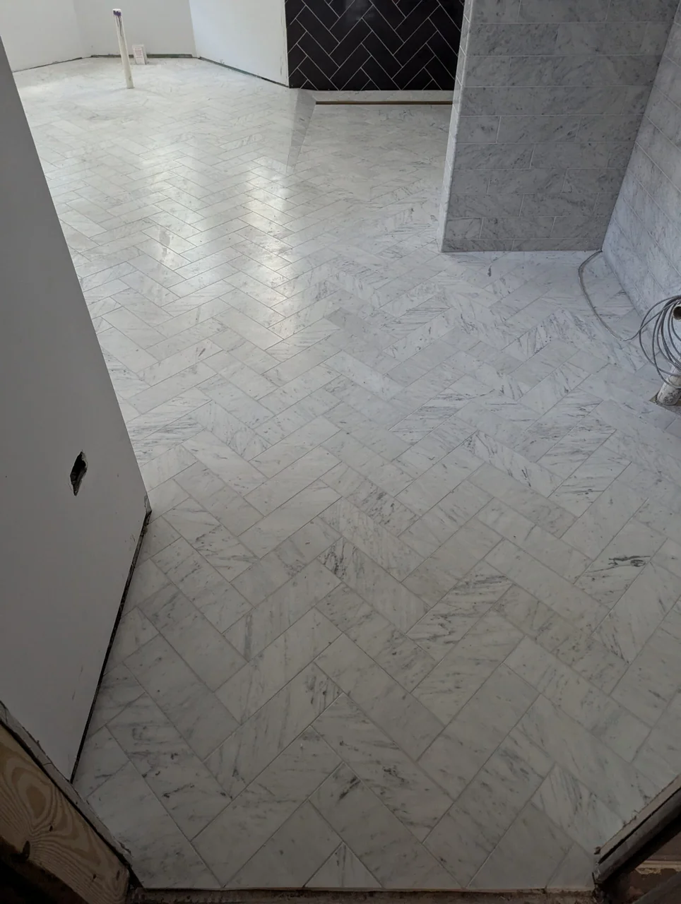 Detail of pale bathroom floor tile