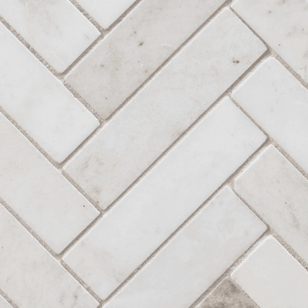 Close detail of a herringbone tile pattern